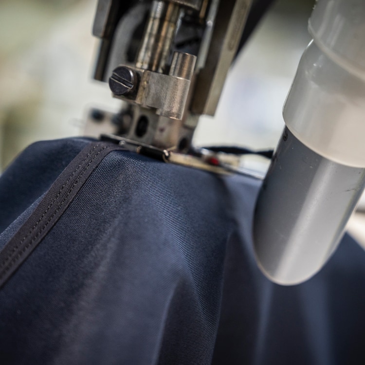 Industrial sewing machine stitching technical sportswear fabric